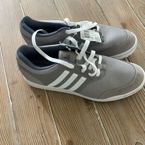 Brand new. Men’s Adidas golf shoes. Brand new. Never worn.